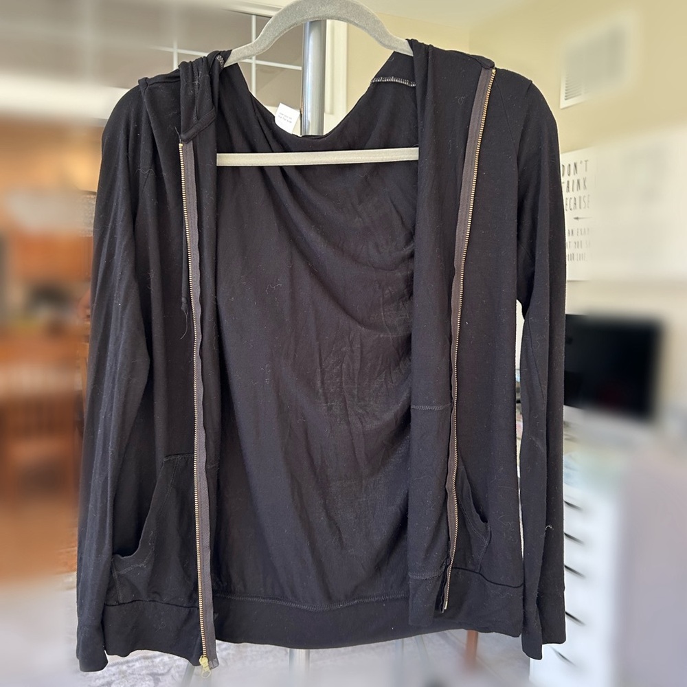 black zip up hoodie